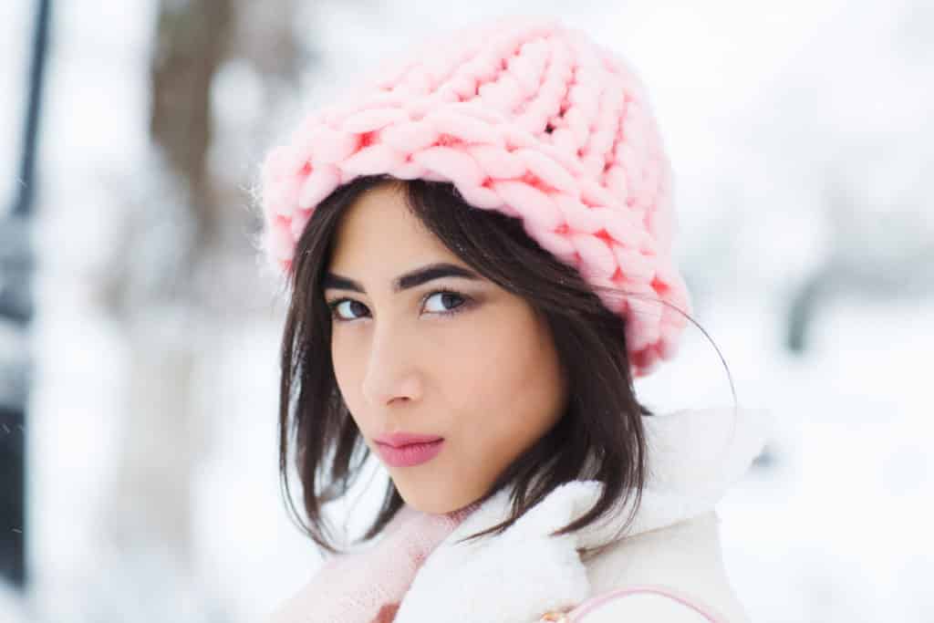 What are the benefits of Merino yarn? 7 Woman Wearing Merino Yarn Beanie